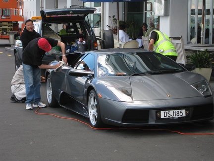 29 how many people does it take to detail a Lambo